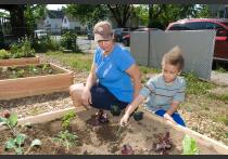 Brenda Wallace and her son hard at work in HAP’s new community garden at 233 Tyler Street in Springfield’s Old Hill neighborhood.
