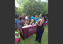 Lawrence CommunityWorks getting information out through tabling.